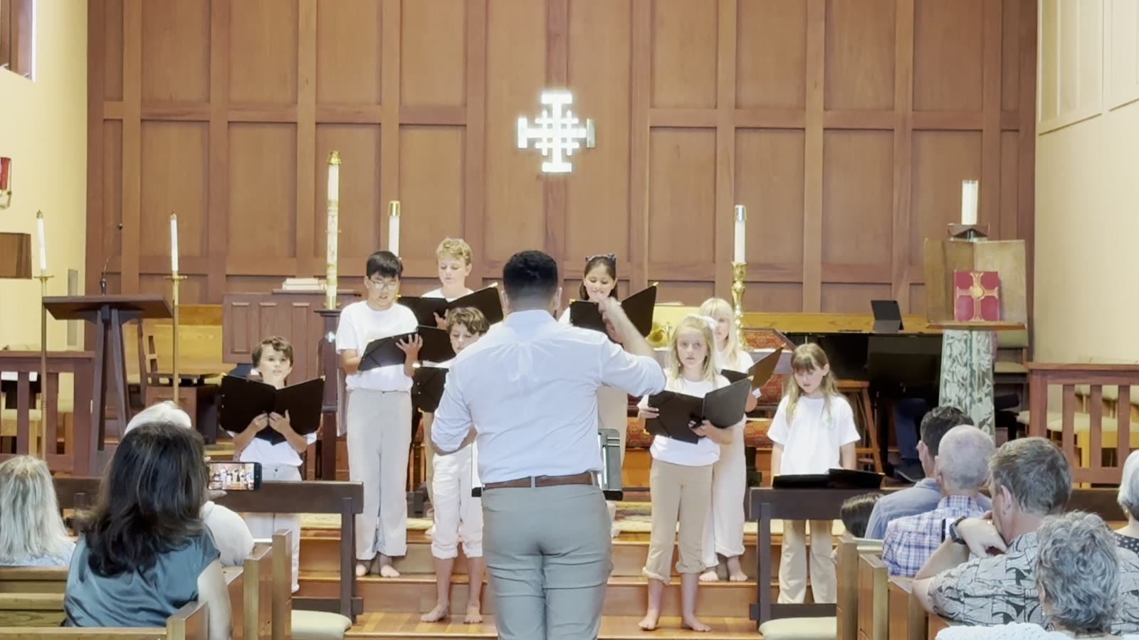 The full chorus and director mid-song at St. Mary’s Episcopal Church